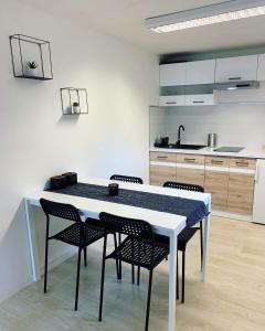 Kuchyň nebo kuchyňský kout v ubytování Apartmány Klárka