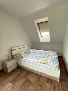 Postel nebo postele na pokoji v ubytování Apartmány Klárka