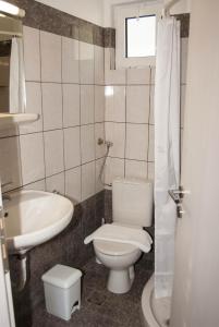 Koupelna v ubytování Ronzi Apartments