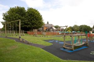 Children's play area at Mill On The Soar by Greene King Inns 