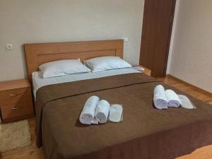 Ένα ή περισσότερα κρεβάτια σε δωμάτιο στο Guest House Maradona
