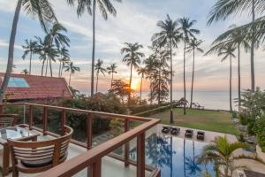 a view of the ocean from the balcony of a resort at Malee Beach A1 in Ko Lanta