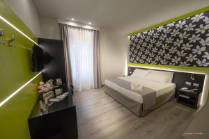 A bed or beds in a room at HOLYGOLD Suite ****