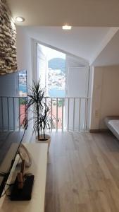 Ένα ή περισσότερα κρεβάτια σε δωμάτιο στο Apartment Ivan&Marko