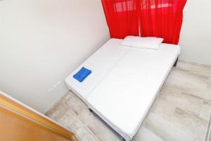 En eller flere senge i et værelse på Apartamentos Almadraba VyB