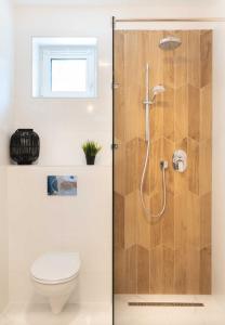 Koupelna v ubytování Fűzliget Surf Garden + 37 fotografií