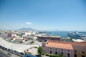an aerial view of a city with the ocean at B&B ICHOME NAPOLI - Maison d'Artiste in Naples