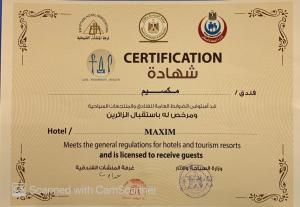 Majutusasutuses Maxim Hotel olev sertifikaat, autasu, silt või muu dokument