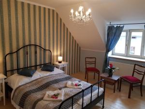 Posteľ alebo postele v izbe v ubytovaní Vila Janáčkova - 1st republic villa