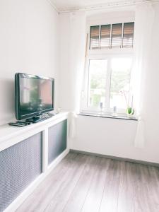 TV a/nebo společenská místnost v ubytování Klärchen's Stube