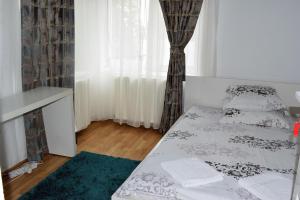 Postel nebo postele na pokoji v ubytování Casa Aurora