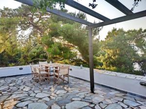 A balcony or terrace at Pine Trees and Sea View Houses in Hydra - Daphne, Chloe, Myrto, Eleni