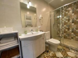 Ванна кімната в Idylia Grand Villas