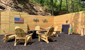 a group of chairs and a table with an american flag at Gatlinburg View Lodge in Gatlinburg +15 photos