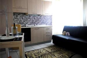 Kuchyň nebo kuchyňský kout v ubytování Residence Rotonda
