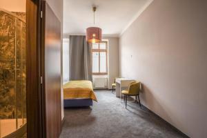 Postel nebo postele na pokoji v ubytování Hotel Pilgrim