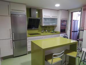 Kuchyň nebo kuchyňský kout v ubytování Casa mireia