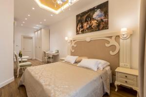 Ένα ή περισσότερα κρεβάτια σε δωμάτιο στο Palace of Dreams Rooms