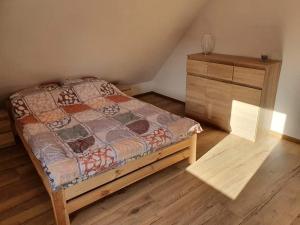 Postel nebo postele na pokoji v ubytování Julka