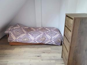 Postel nebo postele na pokoji v ubytování Julka