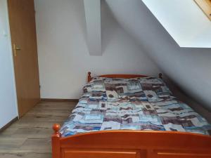 Postel nebo postele na pokoji v ubytování Julka