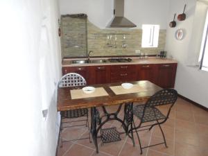 Cuisine ou kitchenette dans l'établissement Da Marusca