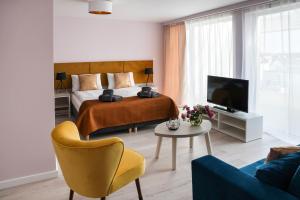 Postel nebo postele na pokoji v ubytování STELLA Resort & SPA