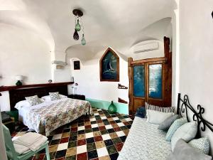 Cama o camas de una habitación en Casa vacanze A lea l'ua