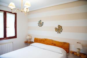 Un pat sau paturi într-o cameră la La Mies