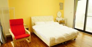 A bed or beds in a room at Warm Home