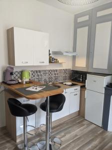 Cuisine ou kitchenette dans l'établissement Appartement au cœur du centre ville de Blois
