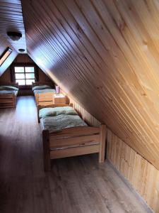 Posteľ alebo postele v izbe v ubytovaní Siberia Haus