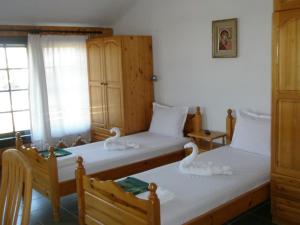 Postel nebo postele na pokoji v ubytování Апартамент КИМАКО, 100м2 на цена за хотелска стая за двама