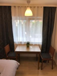 Postel nebo postele na pokoji v ubytování Penzion Hornička