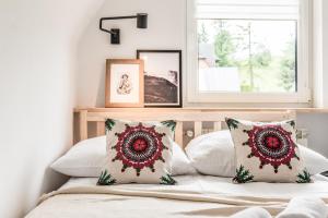 Posteľ alebo postele v izbe v ubytovaní Apartamenty Smrekowa Turnia