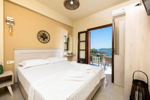 Cama ou camas em um quarto em Pension Sotiria
