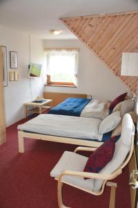 Postel nebo postele na pokoji v ubytování Penzion Benecko 171 + 35 fotografií