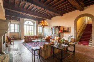 a living room with a couch and a table at Buonvisi B&B in Lucca