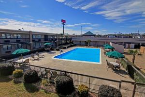 an overhead view of a pool at a hotel at Ramada by Wyndham Macon in Macon