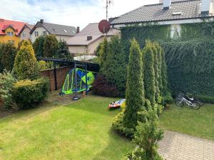 Vonkajšia záhrada v ubytovaní Apartamenty.in Villa Baltic