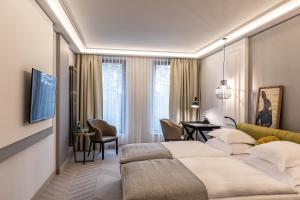 Posteľ alebo postele v izbe v ubytovaní Hotel Traugutta3