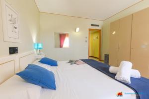 Postel nebo postele na pokoji v ubytování Paradise Beach Resort Selinunte