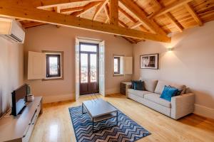 Гостиная зона в Morar Apartments Porto