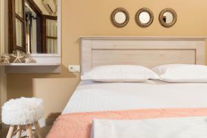 Cama ou camas em um quarto em Pension Sotiria