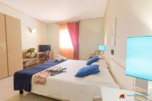 Postel nebo postele na pokoji v ubytování Paradise Beach Resort Selinunte