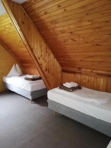 Postel nebo postele na pokoji v ubytování Penzion Luna