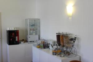 Kuchyň nebo kuchyňský kout v ubytování Hotel Michael