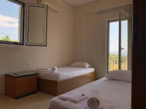 Postel nebo postele na pokoji v ubytování Emerald House