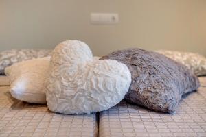 A bed or beds in a room at Villa Es Ratolí