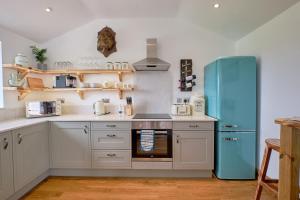 
A kitchen or kitchenette at Harrogate Barns
